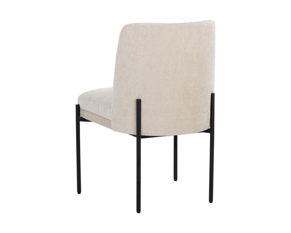 Sunpan Richie Dining Chair - Modern Comfort in Soft Danny Ivory Fabric with Sleek Black Metal Legs