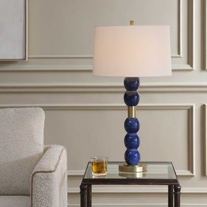 Uttermost Bellore Ceramic Orb Table Lamp Glossy Blue Glaze with Antique Brass Accents