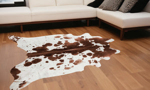 Homeroots 72" X 84" Brown White Cowhide - Rug  Cowhide 316747