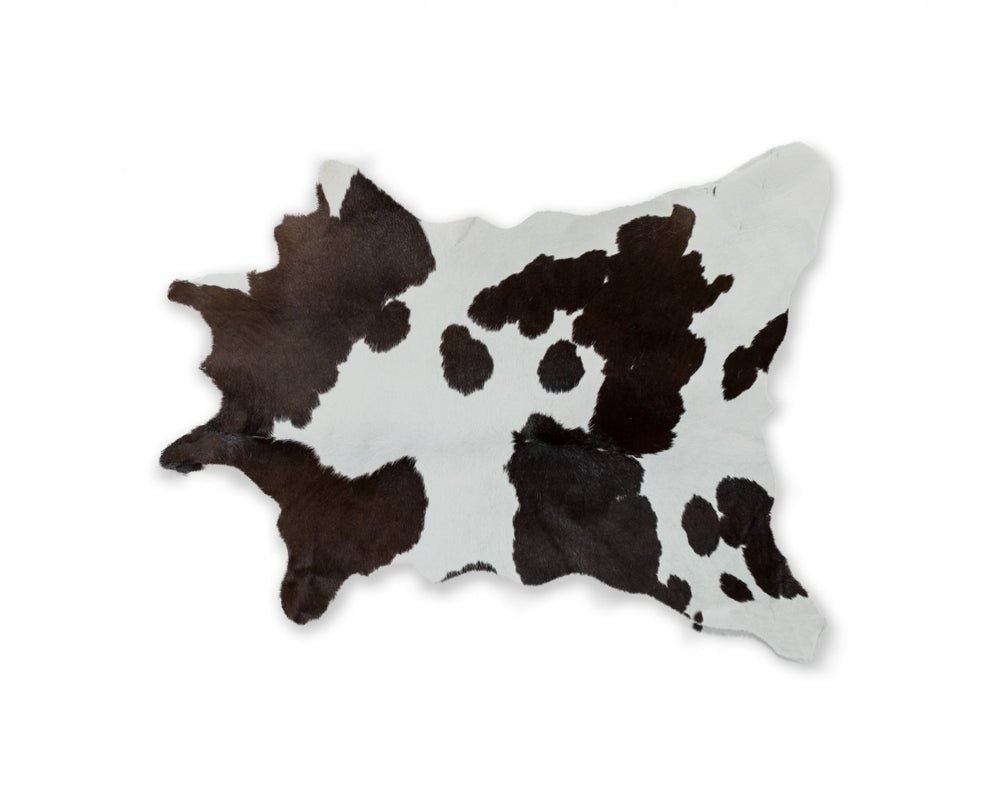 HomeRoots 24" X 36" Luxurious Calfskin Area Rug - Handcrafted Elegance for Timeless Home Décor Style Black/White 316835