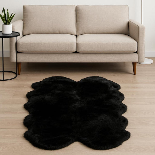 HomeRoots 4' X 6' Genuine Sheepskin Area Rug - Luxurious Softness & Unique Handcrafted Charm for Any Room Black 316898
