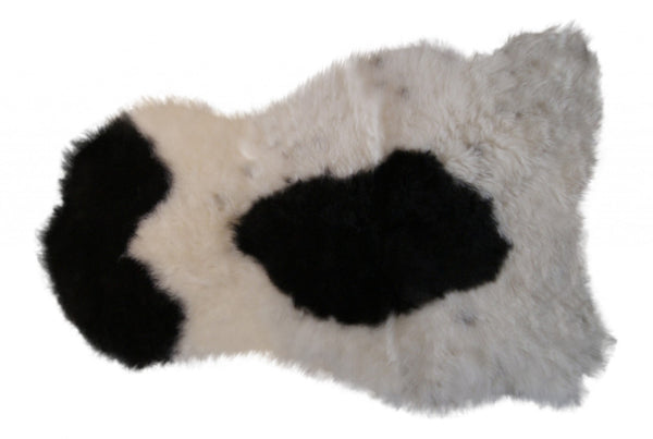 HomeRoots 2' X 3' Luxurious Ivory, Black & Gray Spotted Sheepskin Area Rug - Handcrafted Comfort for Home 316906