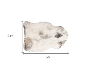 HomeRoots 2' X 3' Luxurious Ivory, Black & Gray Spotted Sheepskin Area Rug - Handcrafted Comfort for Home 316906