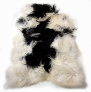 Homeroots 2' X 3' Black And White Spotted Sheepskin Handmade Area Rug  Genuine Sheepskin 316925