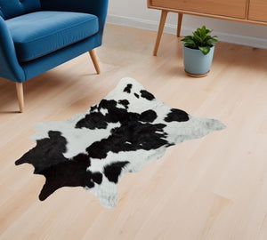 Homeroots 2' X 3' Black And White Cowhide Hand Woven Area Rug Black,White Cowhide 316960