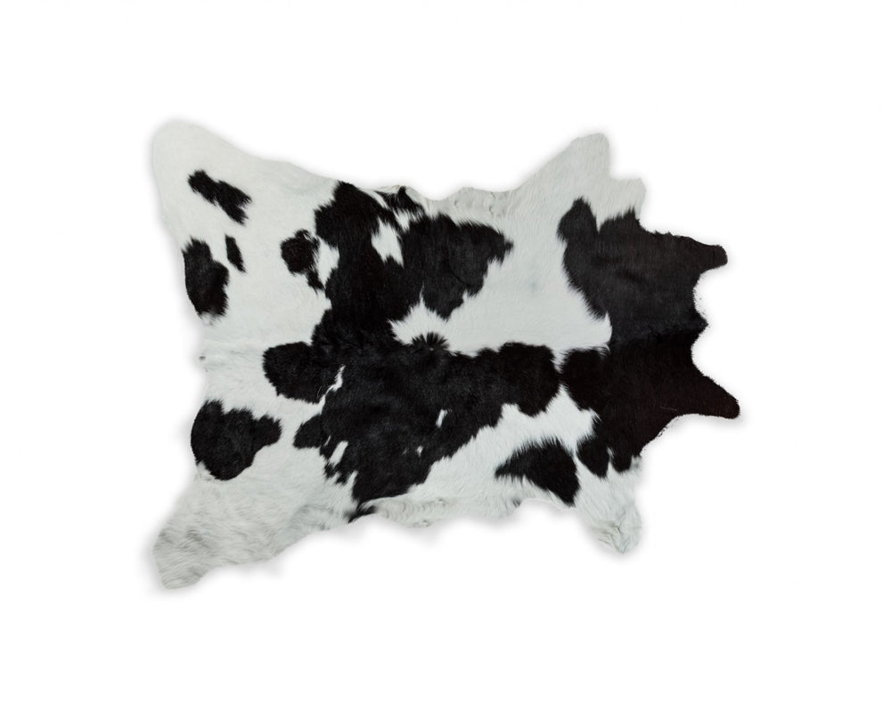 HomeRoots 24" X 36" Calfskin Area Rug – Luxurious Hand-Knotted Brazilian Design for Elegant Interiors Black/White 316960