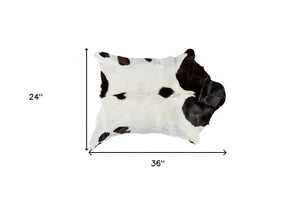 Homeroots 2' X 3' Natural Black And White Calfskin Area Rug White,Chocolate Cowhide 316980