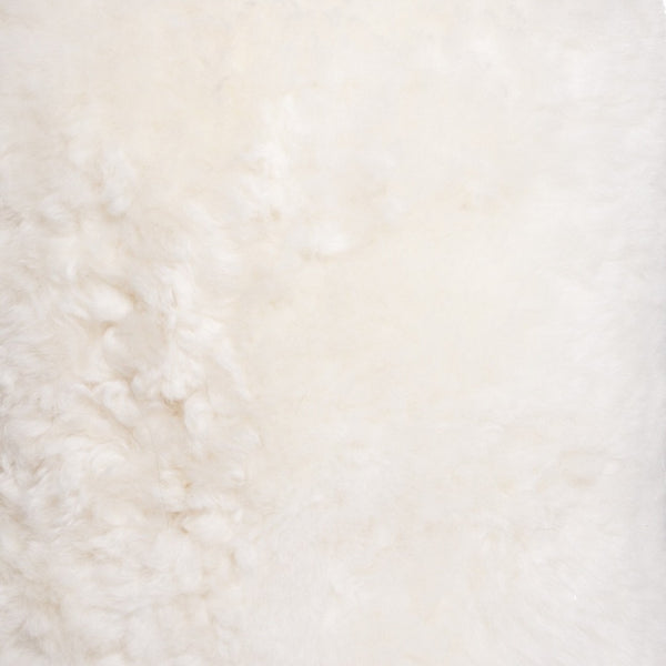 HomeRoots 18" Short-Hair Sheepskin Stump Pouf – Luxurious Comfort, Chic Accent, Portable Footrest for Any Room White 317013