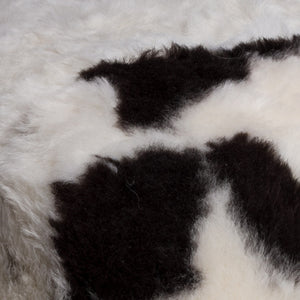 Homeroots 24" X 24" X 12" Spotted Short-hair Sheepskin Cube Pouf Spotted Sheepskin 317026