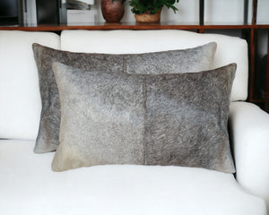 HomeRoots Set of Two Luxurious Cowhide Lumbar Throw Pillows for Elegant Home Décor and Comfort Salt/Pepper Gray/White 317139