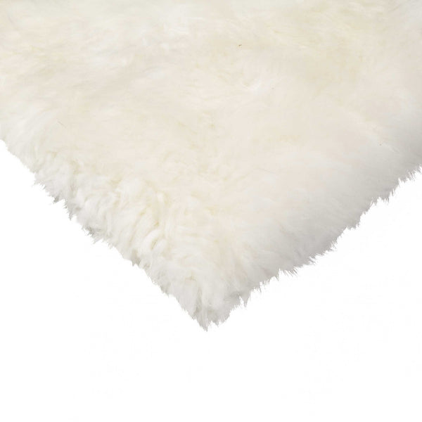 Homeroots 17" X 17" Off White Synthetic Solid Color Pad  Sheepskin 317157