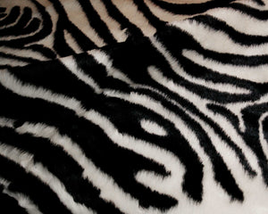 Homeroots 5' X 7' Black And White Faux Cowhide Zebra Print Area Rug  Faux Cowhide 317167