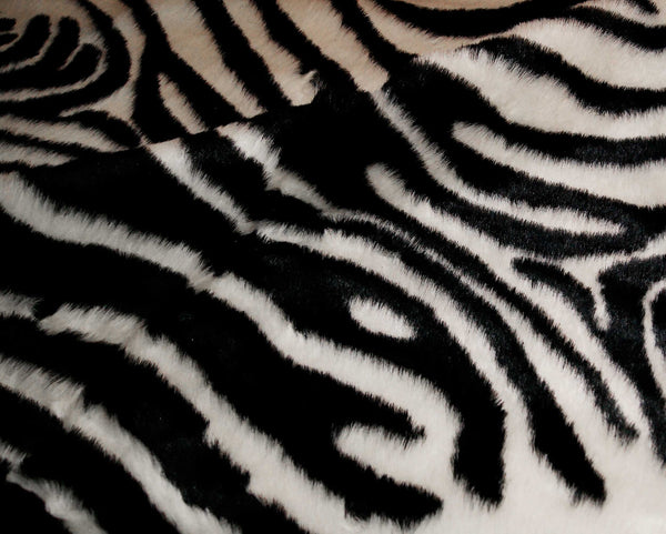 Homeroots 5' X 7' Black And White Faux Cowhide Zebra Print Area Rug  Faux Cowhide 317167