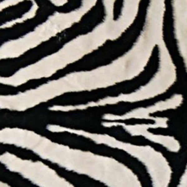 Homeroots 5' X 7' Black And White Faux Cowhide Zebra Print Area Rug  Faux Cowhide 317167