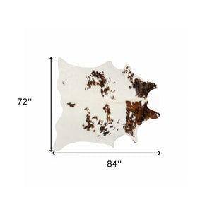 HomeRoots 6' X 7' Brown And White Cowhide Print Area Rug - Rustic Elegance for Modern Interiors & High Traffic Areas 317276