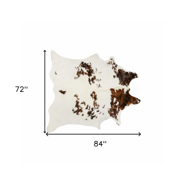 HomeRoots 6' X 7' Brown And White Cowhide Print Area Rug - Rustic Elegance for Modern Interiors & High Traffic Areas 317276