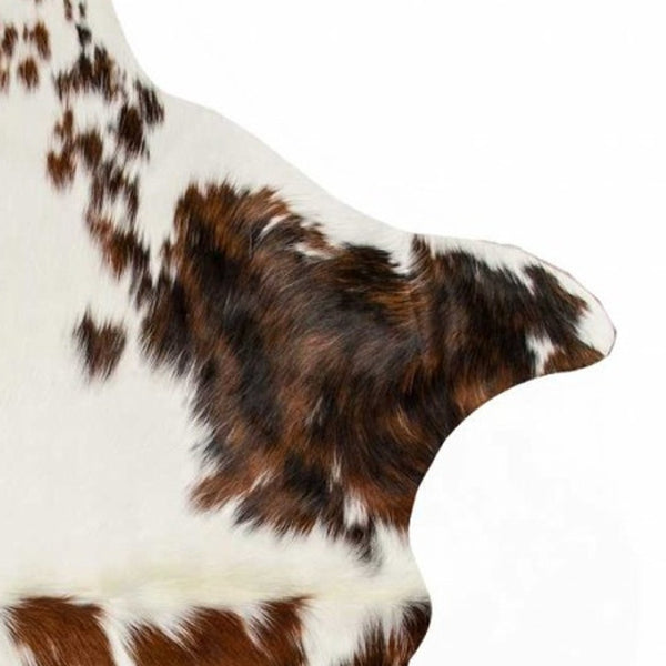 HomeRoots 6' X 7' Brown And White Cowhide Print Area Rug - Rustic Elegance for Modern Interiors & High Traffic Areas 317276