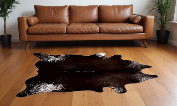 Homeroots 60" X 84" Chocolate And White Cowhide - Area Rug Chocolate,White Cowhide 317321