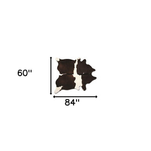 Homeroots 60" X 84" Chocolate And White Cowhide - Area Rug Chocolate,White Cowhide 317323