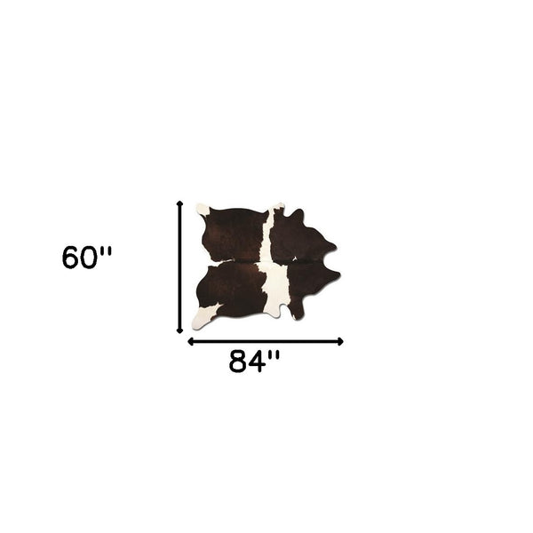Homeroots 60" X 84" Chocolate And White Cowhide - Area Rug Chocolate,White Cowhide 317323