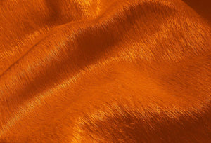 HomeRoots 5' X 7' Cowhide Print Area Rug - Luxurious Texture with Contemporary Style for Modern Living Spaces Orange 317335