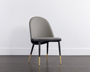 Sunpan Kline Modern Dining Chair with Smooth Curves, Faux Leather Upholstery, and Elegant Gold-Capped Legs Dillon Stratus / Dillon Black