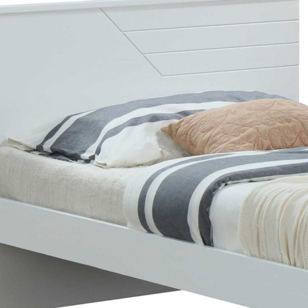 White Solid Wood Twin Bed with Carved Geometric Detailing for a Stylish Kids Room