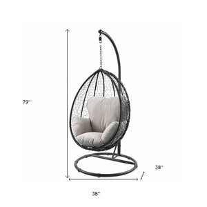 HomeRoots 38" Black Metal Swing Chair with Soft Cushion for Relaxation - Stylish Outdoor and Indoor Seating Beige Fabric And Black 318800