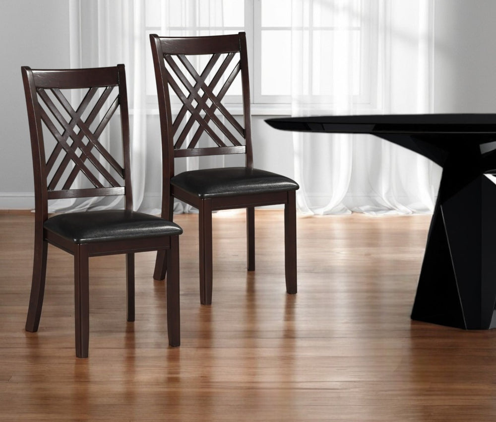 HomeRoots Set of Two Stylish Black Faux Leather Cross-Back Dining Chairs for Versatile Home Decor 318946