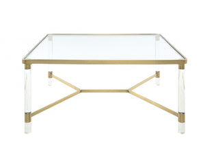 Homeroots 39" X 39" X 17" Clear Acrylic Gold Stainless Steel And Clear Glass Coffee Table   318952