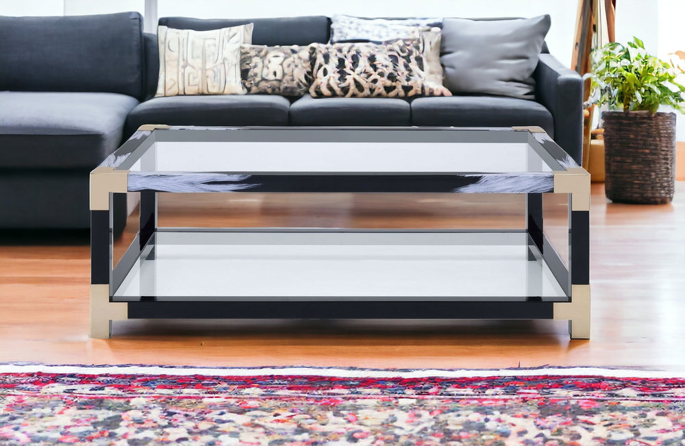Homeroots 54" Clear And Black And White Glass And Metal Coffee Table With Shelf   318998