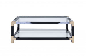 Homeroots 54" Clear And Black And White Glass And Metal Coffee Table With Shelf   318998
