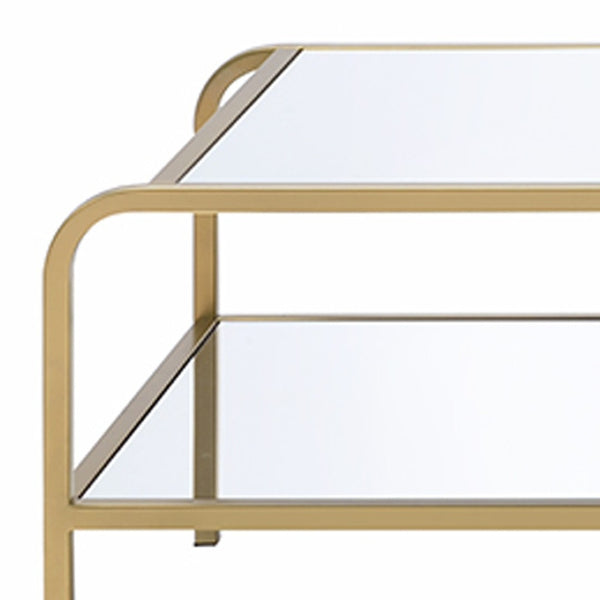 HomeRoots 52" Glamorous Clear Glass Coffee Table with Gold Iron Base & Stylish Storage Shelf for Modern Living 319007