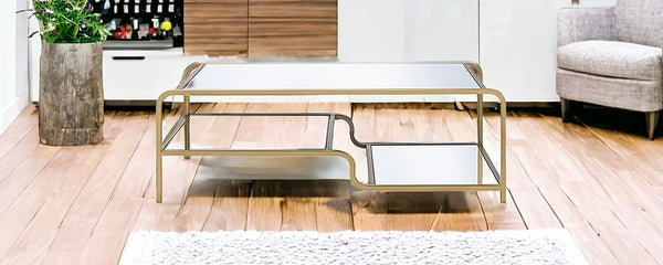 Homeroots 52" X 24" X 18" Gold And Clear Glass Metal Coffee Table   319007