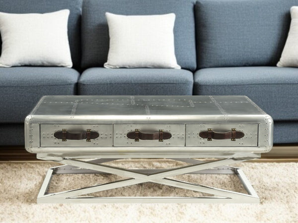 HomeRoots 51" Silver Aluminum Trestle Coffee Table – Modern Design with 3 Drawers for Stylish Storage Solution 319024