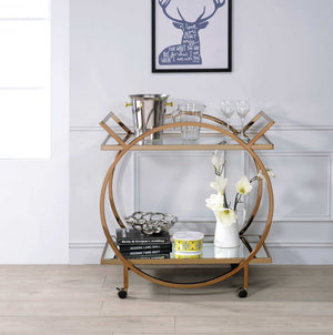 HomeRoots 33" Champagne Metal Tube Serving Cart - Luxurious Glass Top, Mirrored Shelf & Smooth Rolling Casters 319138