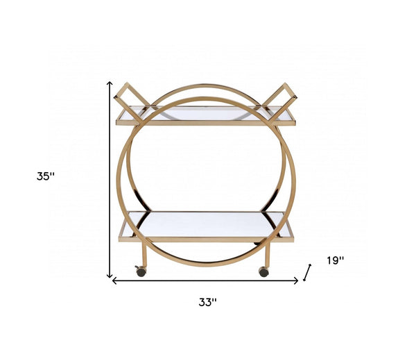 HomeRoots 33" Champagne Metal Tube Serving Cart - Luxurious Glass Top, Mirrored Shelf & Smooth Rolling Casters 319138
