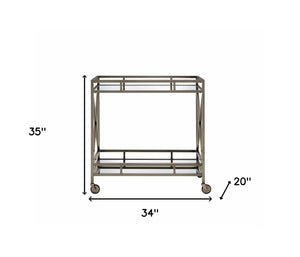 HomeRoots 34" Elegant Antique Brass Serving Cart with Mirrored Shelves for Stylish Entertaining and Display 34" X 20" X 35" 319141