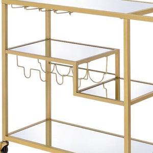 HomeRoots 40" Clear Glass and Gold Iron Rolling Prep Table - Stylish Kitchen Cart with Storage and Mobility 40" X 16" X 37" 319143