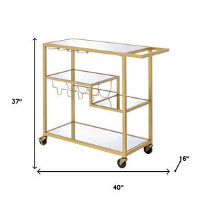 HomeRoots 40" Clear Glass and Gold Iron Rolling Prep Table - Stylish Kitchen Cart with Storage and Mobility 40" X 16" X 37" 319143