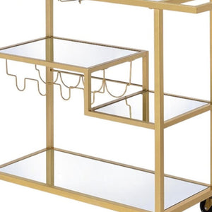 HomeRoots 40" Clear Glass and Gold Iron Rolling Prep Table - Stylish Kitchen Cart with Storage and Mobility 40" X 16" X 37" 319143