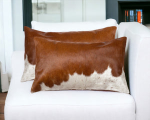 HomeRoots Set of Two Luxurious Cowhide Lumbar Throw Pillows for Elegant Home Décor and Comfort Brown/White 328290