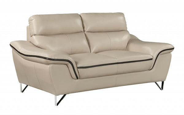Homeroots 69" Beige And Silver Faux Leather Love Seat   329492