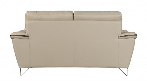 Homeroots 69" Beige And Silver Faux Leather Love Seat   329492