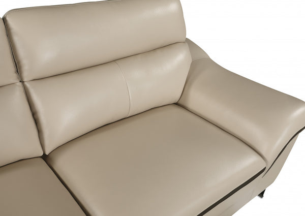 Homeroots 69" Beige And Silver Faux Leather Love Seat   329492