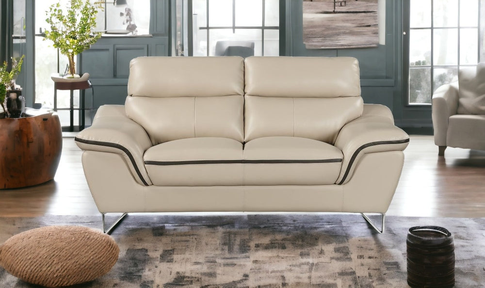 Homeroots 69" Beige And Silver Faux Leather Love Seat   329492