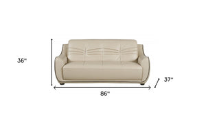 Homeroots 86" Beige Faux Leather Sofa With Black Legs   329507