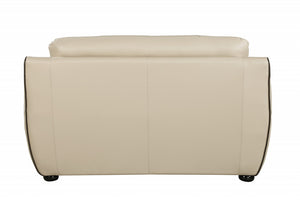 Homeroots 69" Beige And Black Faux Leather Love Seat   329508