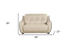Homeroots 69" Beige And Black Faux Leather Love Seat   329508