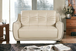 Homeroots 69" Beige And Black Faux Leather Love Seat   329508